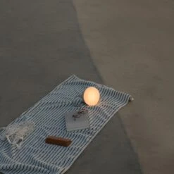 New Works Sphere Lamp Portable Dark Bronze -Teddyssmith shop new works beach sphere adventure light warm grey 2 p